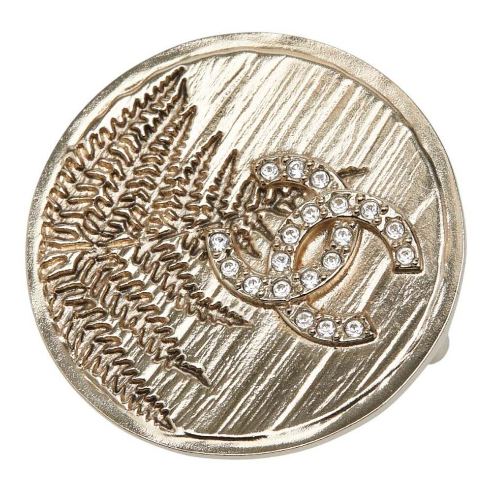CHANEL Gold Logo Brooch